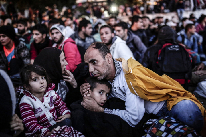 TOPSHOTS Migrants and refugees wait at Istanbul's Esenler Bus Terminal for buses to the Turkish-Greek border after authorities withheld tickets to Turkish border towns on September 16, 2015. Hundreds of refugees camped out at the main bus station in Istanbul for a second night running after being refused tickets for Edirne, some 250 kilometres (150 miles) away. Many of the refugees seeking to leave Turkey have been living in the country for months, sometimes years, after fleeing the bloody civil war in neighbouring Syria. AFP PHOTO / YASIN AKGULYASIN AKGUL/AFP/Getty Images