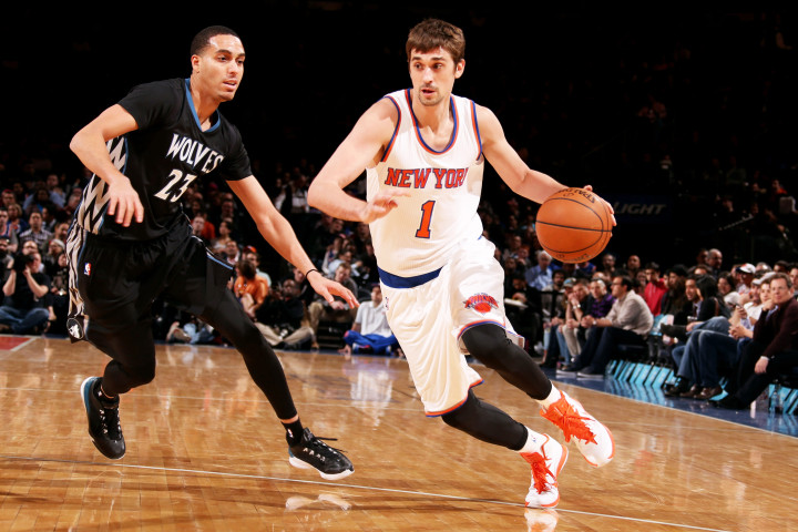 NEW YORK, NY - MARCH 19: Alexey Shved #1 of the New York Knicks drives against Kevin Martin #23 of the Minnesota Timberwolves on March 19, 2015 at Madison Square Garden in New York City. NOTE TO USER: User expressly acknowledges and agrees that, by downloading and or using this Photograph, user is consenting to the terms and conditions of the Getty Images License Agreement. Mandatory Copyright Notice: Copyright 2015 NBAE (Photo by Nathaniel S. Butler/NBAE via Getty Images)