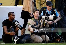 Kevin with photographers