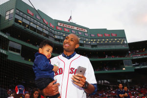 BOSTON, MA - JULY 08:  Al Horford of the Boston Celtics holds his son Ean before throwing out the first pitch before the game between the Boston Red Sox and the Tampa Bay Rays at Fenway Park on July 8, 2016 in Boston, Massachusetts.  (Photo by Maddie Meyer/Getty Images)